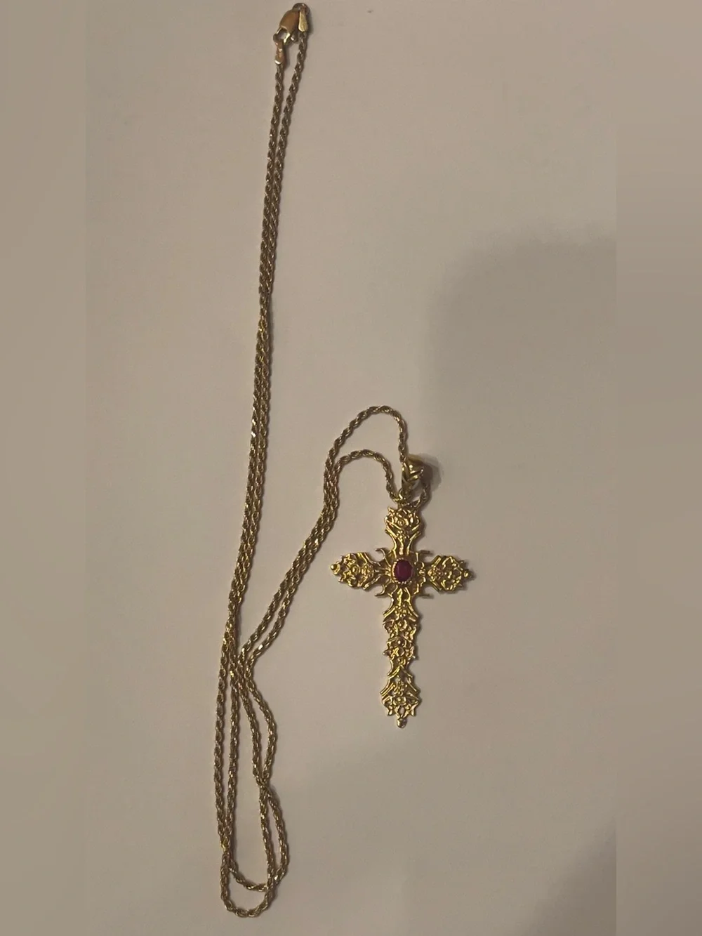 18 karat chain with a cross pendant